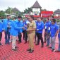 Foto : Bupati Bekasi menghadiri kegiatan apel akbar pemuda KNPI pada Senin (17/2) bertempat di Plaza Pemda, Cikarang Pusat.