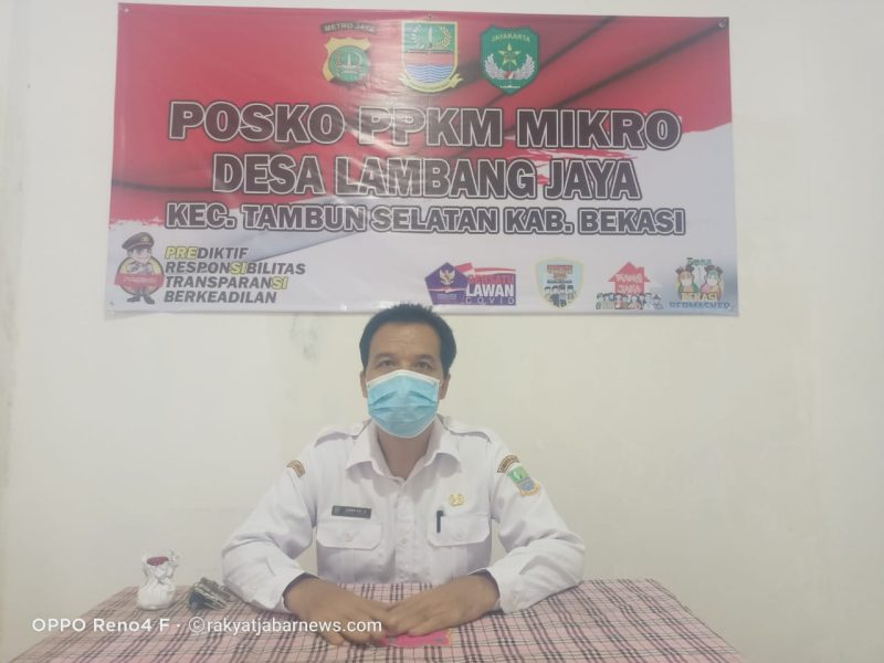 Kepala Desa Lambangjaya, Kimlan Syahroni.