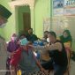Kepala Desa Muktiwari, Bahrudin, S.E. Memonitoring Vaksinasi Massal di Kantor Desa Muktiwari, pada Jumat (9/9/2021).