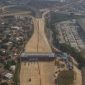 Foto udara sejumlah kendaran melintasi Jalan Tol Cibitung-Cilincing seksi 1 interchange Telaga Asih di Cibitung, Kabupaten Bekasi, Jawa Barat, Sabtu (31/7/2021). [ANTARA FOTO/ Fakhri Hermansyah].