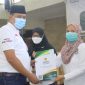 Badan Amil Zakat Nasional (Baznas) Kota Bekasi mendistribusikan bantuan dana zakat sebesar Rp 3.849.600.000 di Aula Masjid Al-Barkah.