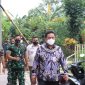 Foto : Sekretaris Daerah Kabupaten Bekasi, Dedy Supriyadi bersama Dandim 0509/Kabupaten Bekasi Letkol Inf M Horison Ramadhan, Camat Cibitung Encun Sunarto dan perwakilan PT Hyundai meninjau lokasi pembangunan ecovillage di Desa Wanajaya Kecamatan Cibitung, Kamis (24/03/22).