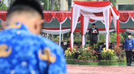 Foto : INSPEKTUR UPACARA: Plt Bupati Bekasi, Akhmad Marjuki menjadi inspektur upacara peringatan Hari Kebangkitan Nasional (HARKITNAS) yang ke-114 Tahun 2022, di Plaza Pemerintah Daerah Kabupaten Bekasi, Sukamahi, Cikarang Pusat, Jum'at (19/05/2022). 
