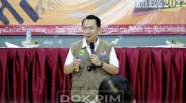 foto : Pj Bupati Bekasi Dani Ramdan saat berbicara di acara Pelatihan Pencegahan dan Mitigasi Bencana yang diselenggarakan oleh BPBD Kota Bekasi, di Gedung Balai Warga, Perumahan Irigasi Bekasi Timur, Jumat (05/08). Foto : Prokopim Pemkab Bekasi.
