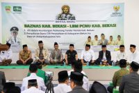 Pj Bupati Bekasi Dani Ramdan, membuka secara resmi acara Bahtsul Masail yang digelar Baznas Kabupaten Bekasi bersama LBM PCNU Kabupaten Bekasi di Aula Kantor Baznas Kabupaten Bekasi, Sukamahi, Cikarang Pusat, Selasa.
