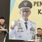 Pj Bupati Bekasi Dani Ramdan saat menyampaikan pengarahan di acara Pembinaan Peningkatan Kapasitas Aparatur Pemerintah Desa tahun 2023 yang digelar oleh Dinas Pemberdayaan Masyarakat dan Desa (DPMD) di Hotel Primebize Cikarang Selatan, pada Selasa (7/2/2023).