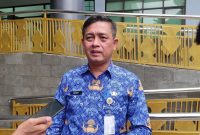 Kepala Dinas Sumber Daya Air Bina Marga dan Bina Kontruksi (SDA-BMBK) Kabupaten Bekasi, Henri Lincoln.