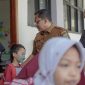 Kepala Dinas Pendidikan Kabupaten Bekasi, Imam Faturahman (kiri) pada saat kunjungan ke sekolah.