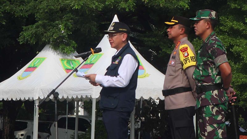 Pj Bupati Bekasi Dani Ramdan memimpin Apel Gelar Pasukan Operasi Kepolisian Terpusat (Ketupat-2024) dalam rangka pengamanan Idul Fitri 1445 Hijriah tahun 2024. Apel ini diselenggarakan oleh Polres Metro Bekasi, di 