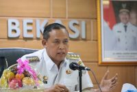 ali Kota Bekasi Tri Adhianto memimpin langsung kegiatan Verifikasi Lanjutan Kota Sehat 2025 yang berlangsung secara virtual di Aula Nonon Sonthanie, Kantor Wali Kota Bekasi.