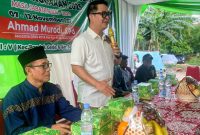 Anggota DPRD Kota Bekasi, Ahmad Murodi, S.Pd., saat menyampaikan sambutan dalam kegiatan reses masa sidang tahun anggaran 2025 di Kelurahan Jaticempaka, Kecamatan Pondok Gede, Jumat (7/11/2025). Kegiatan tersebut menjadi ajang serap aspirasi warga untuk peningkatan pembangunan dan kesejahteraan masyarakat.
