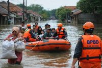 Petugas BPBD Kabupaten Bekasi mengevakuasi warga terdampak banjir menggunakan perahu karet di kawasan permukiman yang terendam akibat tingginya curah hujan, Minggu (18/1/2026). Banjir merendam puluhan desa di sejumlah kecamatan dengan ketinggian air bervariasi hingga dua meter.