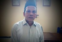 Ketua Panitia BPD Desa Muktiwari, Husin Syahrulloh, saat memberikan keterangan terkait polemik DPT yang disorot warga.