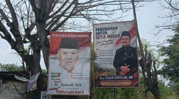 SETIAMEKAR — Suasana Pemilihan Kepala Desa (Pilkades) Setiamekar kian hangat dengan bermunculannya spanduk dan baliho dukungan dari para bakal calon. Dua figur utama yang menarik perhatian warga adalah petahana H. Suryadi, S.H. dan calon pengusung perubahan Drs. Kasan Abdullah, MM.