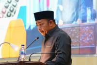 Anggota DPRD Kabupaten Bekasi sekaligus Ketua Fraksi PKB Ahmad Faisal S.H.I saat membacakan laporan pada paripurna DPRD Kab Bekasi Jum'at (31/7). Dok. Istimewa
