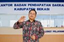 Kepala Bidang Pengendalian dan Evaluasi Pendapatan Daerah Bapenda Kabupaten Bekasi, Puji Nugraha